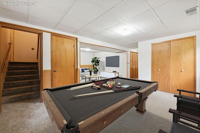 Virtually staged - another view of the family room area. | Image 18