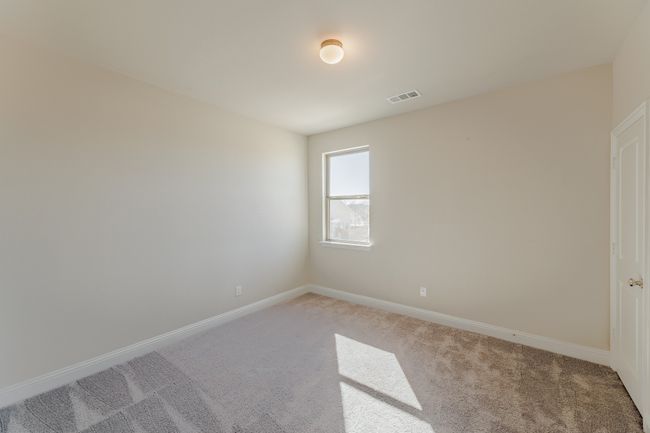 Spare room with light carpet and baseboards | Image 22