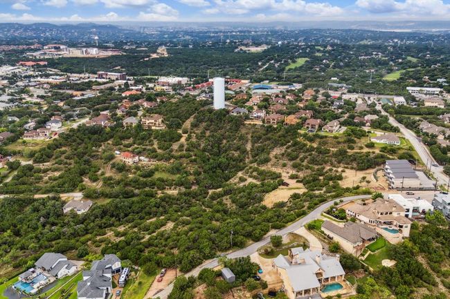 Aerial view of property's location featuring nearby suburban area | Image 4