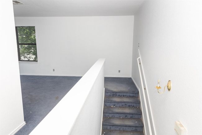 Stairway featuring carpet and baseboards | Image 19