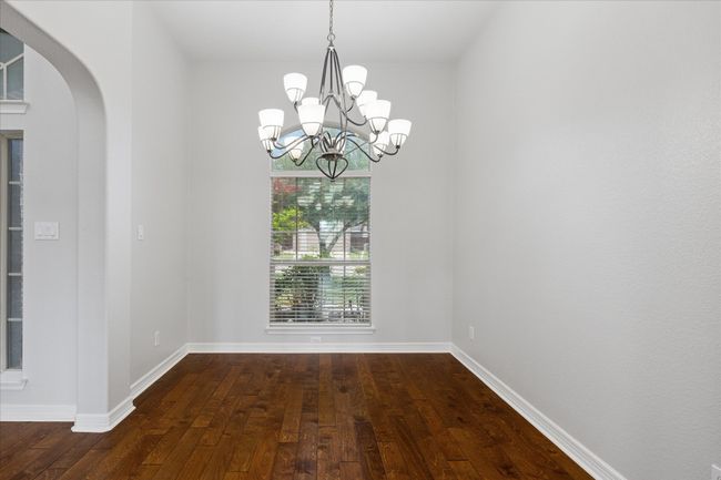Dining area with wood flooring | Image 5