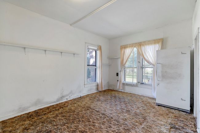 View of carpeted spare room | Image 21