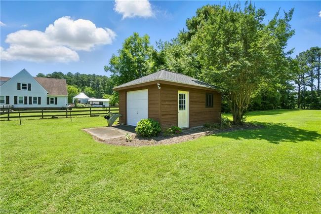 Secondary detached garage with power-the perfect workshop. | Image 42