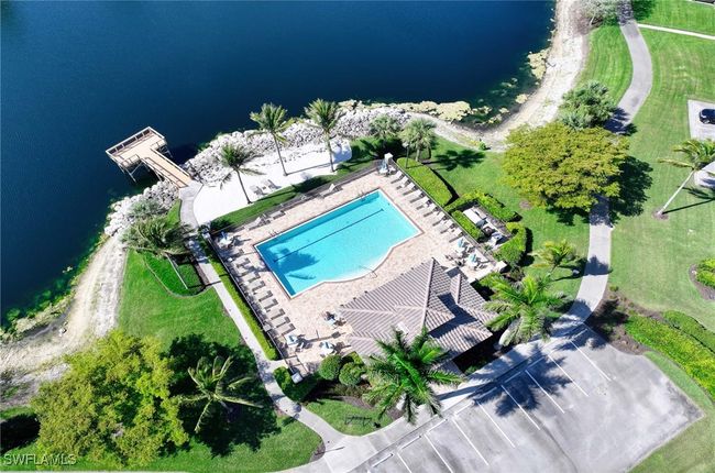 The Island Pool. Satellite pool with kitchenette, book club, and rest rooms. 30 second drive from condo. | Image 17