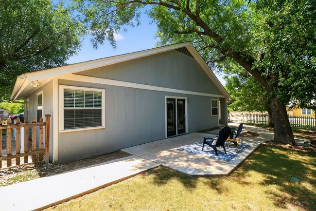 Fully Fenced Yard with Shade Trees and Gate | Image 28