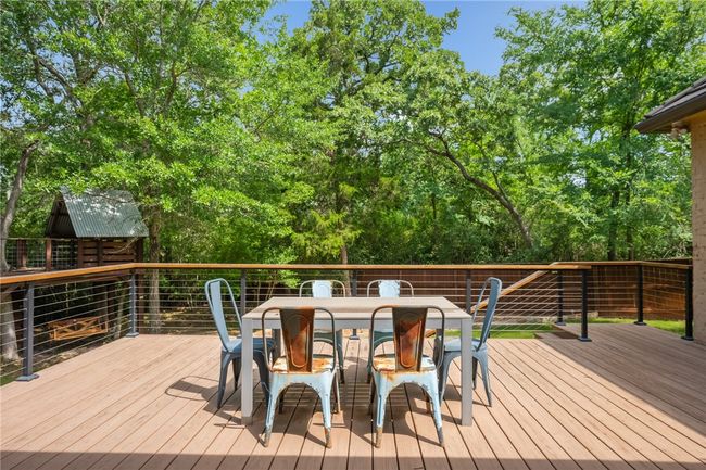 Wooden deck with outdoor dining area | Image 28