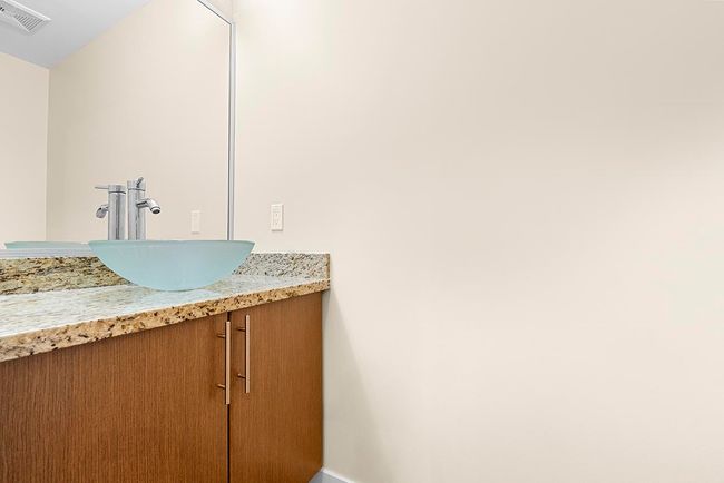 Bathroom featuring vanity and visible vents | Image 17