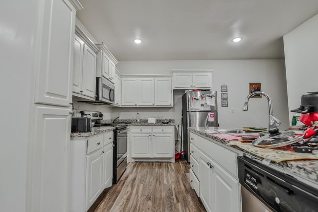 6906 20 Th St, Townhouse with 3 bedrooms, 2 bathrooms and null parking in Lubbock TX | Image 5