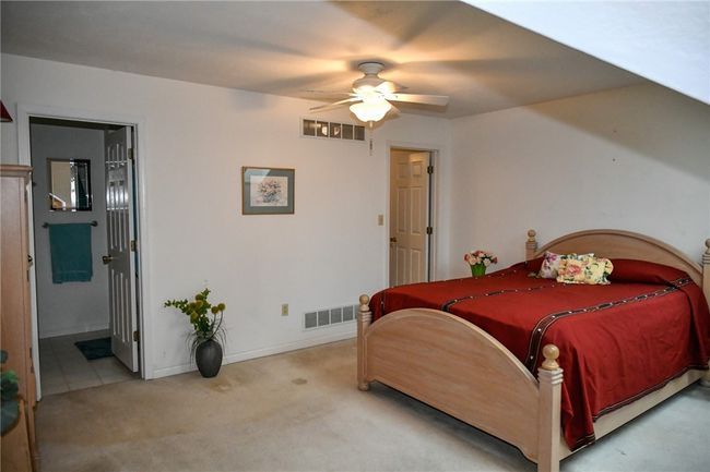 There is no door at the top of the stairs, but this is equipped with full bathroom and closet | Image 40