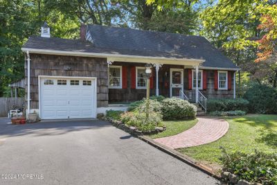 Charming custom home. 3 Bedrooms 2 full baths in ground pool. Sits in the dead end of the street. Huge lot | Image 1