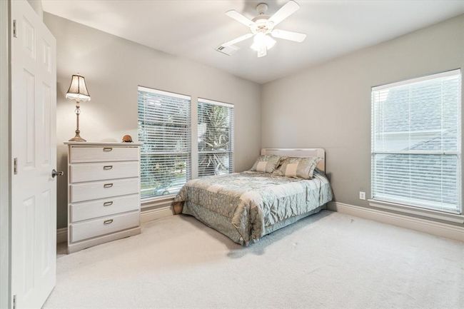 Bedroom #5 is filled with natural light. | Image 32