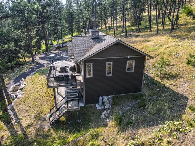 21208 Osprey Loop, House other with 4 bedrooms, 3 bathrooms and null parking in Rollins MT | Image 37