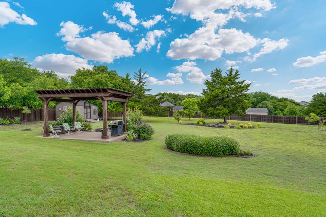 Beautifully landscaped backyard, storage shed | Image 33