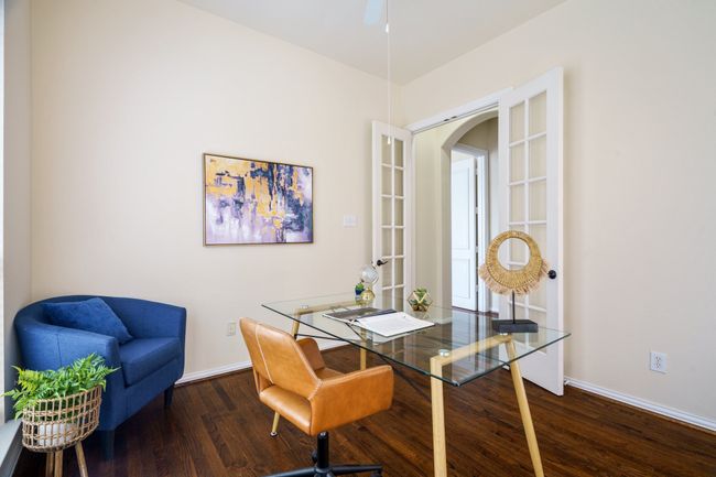 Office featuring french doors, baseboards, wood floors, and a ceiling fan | Image 10