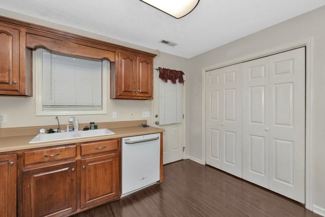 Kitchen - wood flooring and cabinetry, white appliances | Image 4