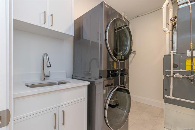 Laundry Room with washing sink and room for extra storage | Image 22