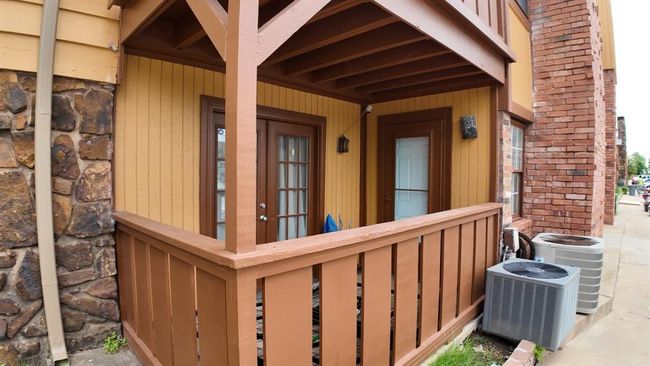 Property entrance with stone siding | Image 12