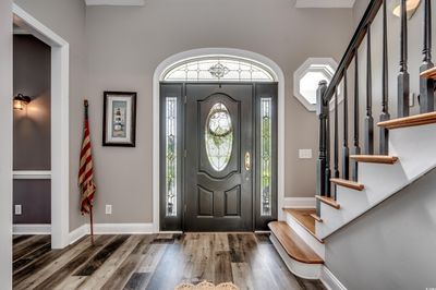 Foyer entrance with dark hardwood / wood-style floors | Image 2