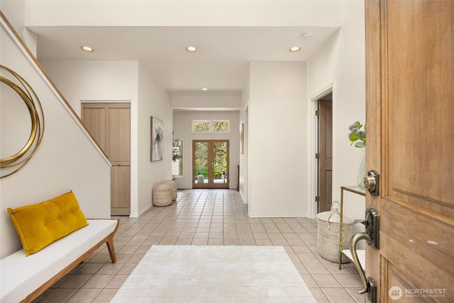 Upon entering this lovely home, you are welcomed by the grand double-story foyer which is flooded with tons of natural light. | Image 4
