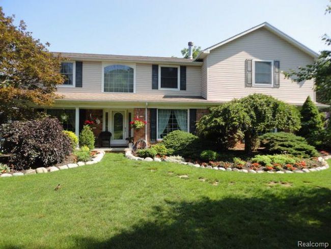 8842 Thorntree Drive, Home with 4 bedrooms, 3 bathrooms and null parking in Grosse Ile Twp MI | Image 1