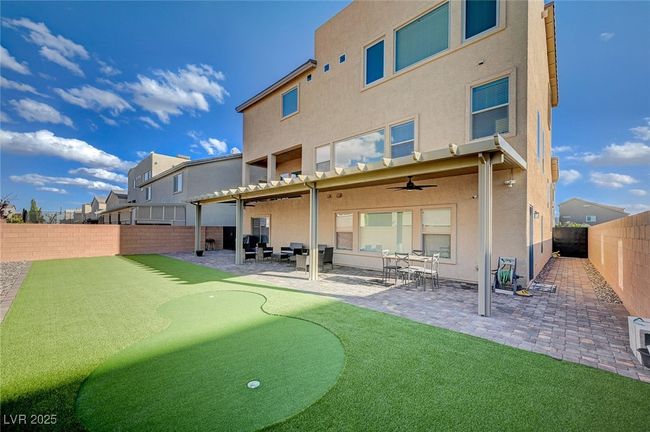 Private Putting Green, Covered Patio, Completely Fenced/ Wrought Iron Gates on Huge Corner Lot | Image 44