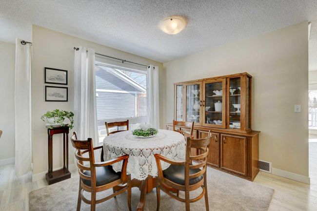620 Woodside Drive Nw, Home with 4 bedrooms, 3 bathrooms and 4 parking in Airdrie AB | Image 7