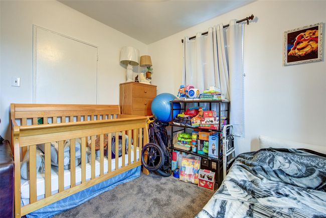 View of carpeted bedroom | Image 8