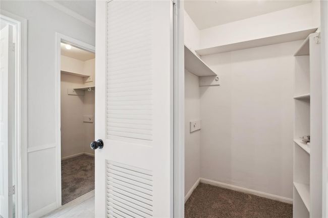 The primary bedroom includes two spacious walk-in closets. | Image 26