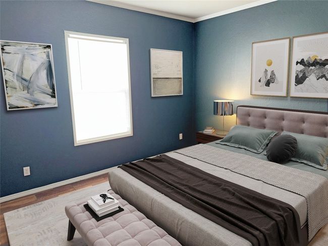 Bedroom with wood finished floors, multiple windows, and crown molding | Image 19
