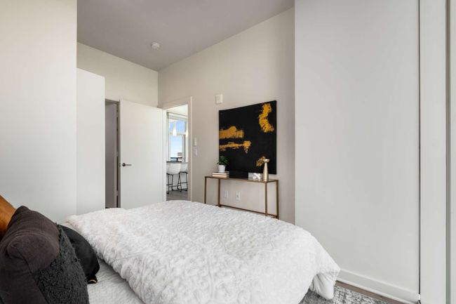 Cozy and comfortable, this secondary bedroom would also make a breathtaking home office. | Image 38