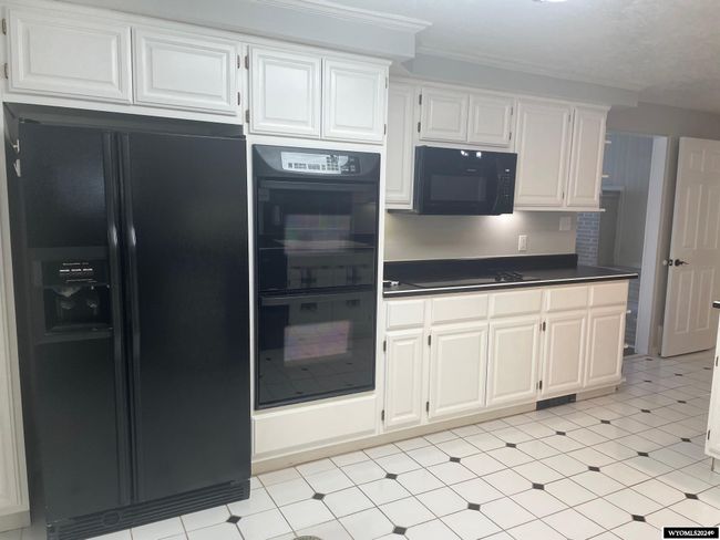 405 Harshman St, House other with 4 bedrooms, 1 bathrooms and null parking in Rawlins WY | Image 10