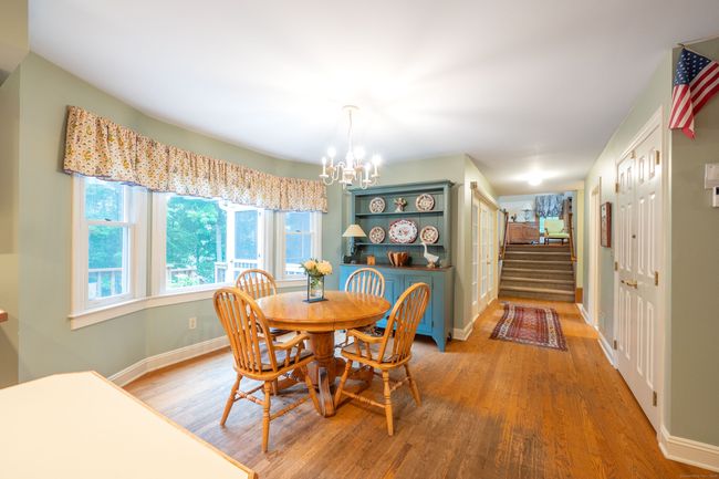 Dining area and hallway to 3/4 family room | Image 17