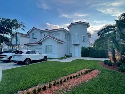 7064 Nw 113th Pl, House other with 6 bedrooms, 3 bathrooms and null parking in Doral FL | Image 2