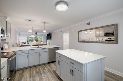 e106-3021 Sandpiper Bay Cir, NAPLES, FL, 34112-5674 | Card Image