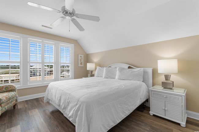 Inlet View Bedroom featuring a vaulted ceiling, and ceiling fan | Image 28