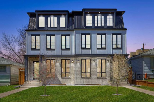 909 32 Street Nw, Home with 4 bedrooms, 4 bathrooms and 4 parking in Calgary AB | Image 2