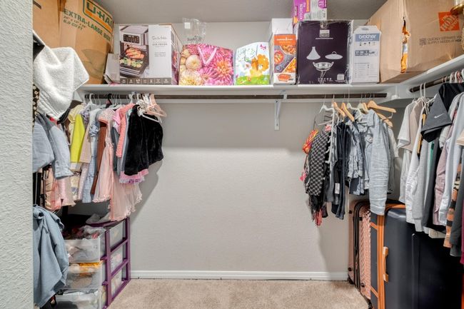 Walk in closet in Primary | Image 20