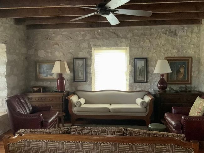 Open concept kitchen, dining and living room. | Image 5