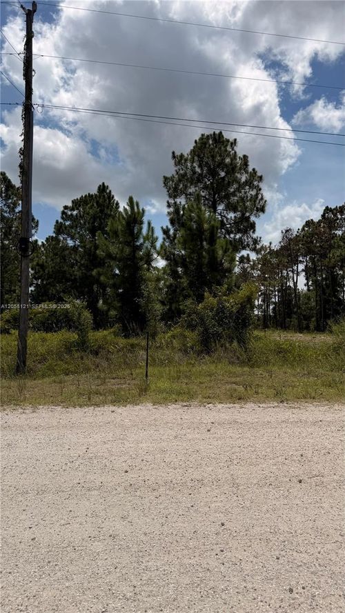215 N Kennel St, Clewiston, FL, 33440-7906 | Card Image