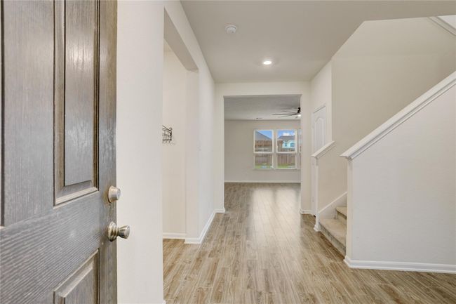 As you enter the home, you are greeted with tall ceilings and ample light. | Image 4