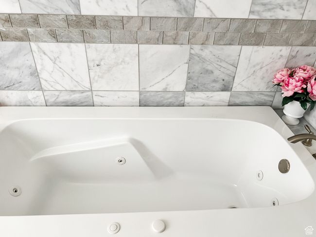 Master Bathroom featuring a whirlpool tub | Image 27