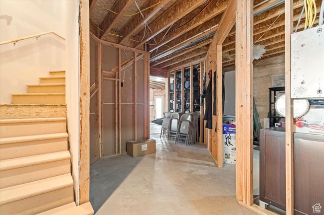 Unfinished basement featuring stairs | Image 40