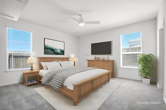 Bedroom featuring carpet floors and ceiling fan | Image 24