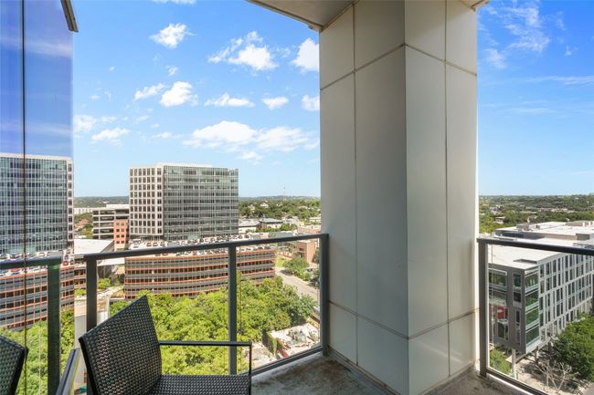 Balcony featuring a city view | Image 27