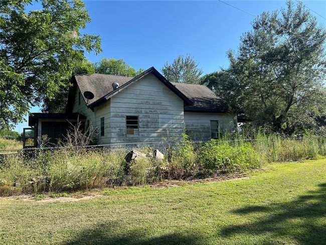 View of home's exterior featuring a yard | Image 37