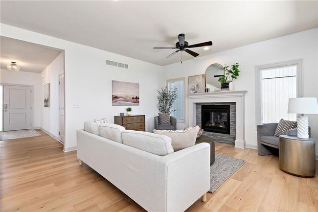 NOT ACTUAL HOME: living room | Image 12