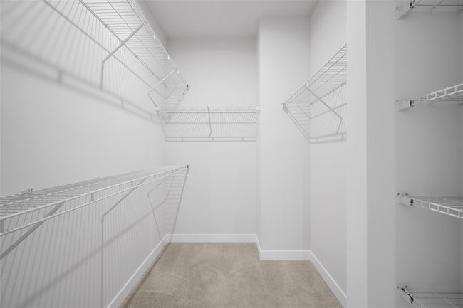 Primary bedroom large walk-in closet | Image 15
