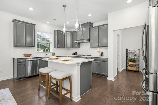 View of kitchen/pantry/back hall/drop zone. | Image 10