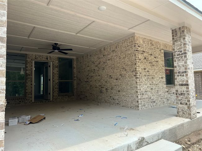 View of patio with ceiling fan | Image 22