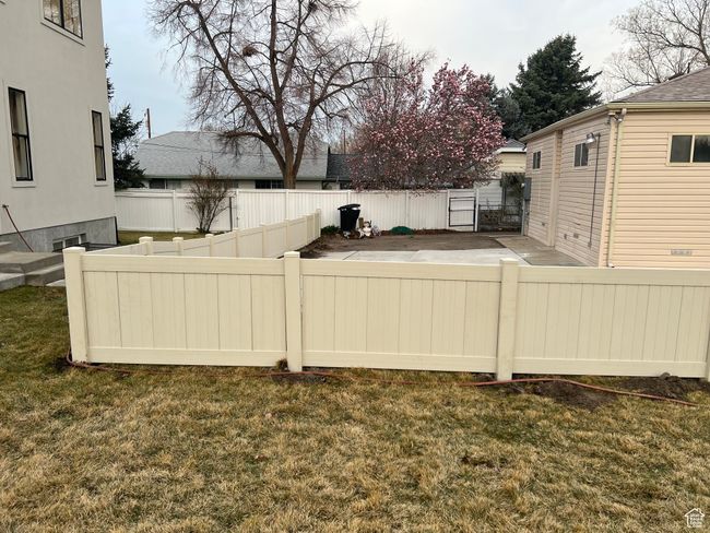 View of yard with a fenced backyard | Image 31